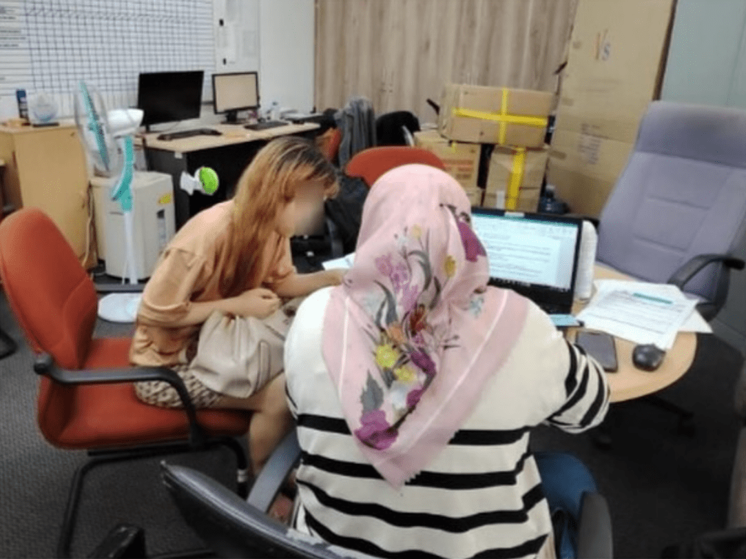 officer investigating Adelaine Chang in the office