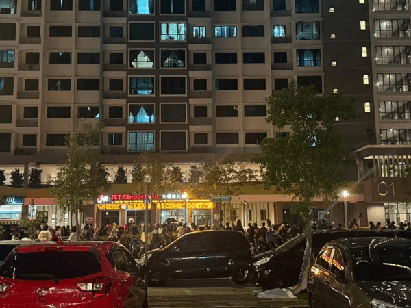 Onlookers gathering around at Sungai Ara apartment 2