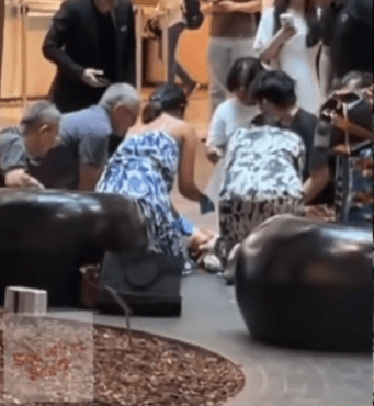 Passerby doing CPR on woman who fell at Jewel Changi