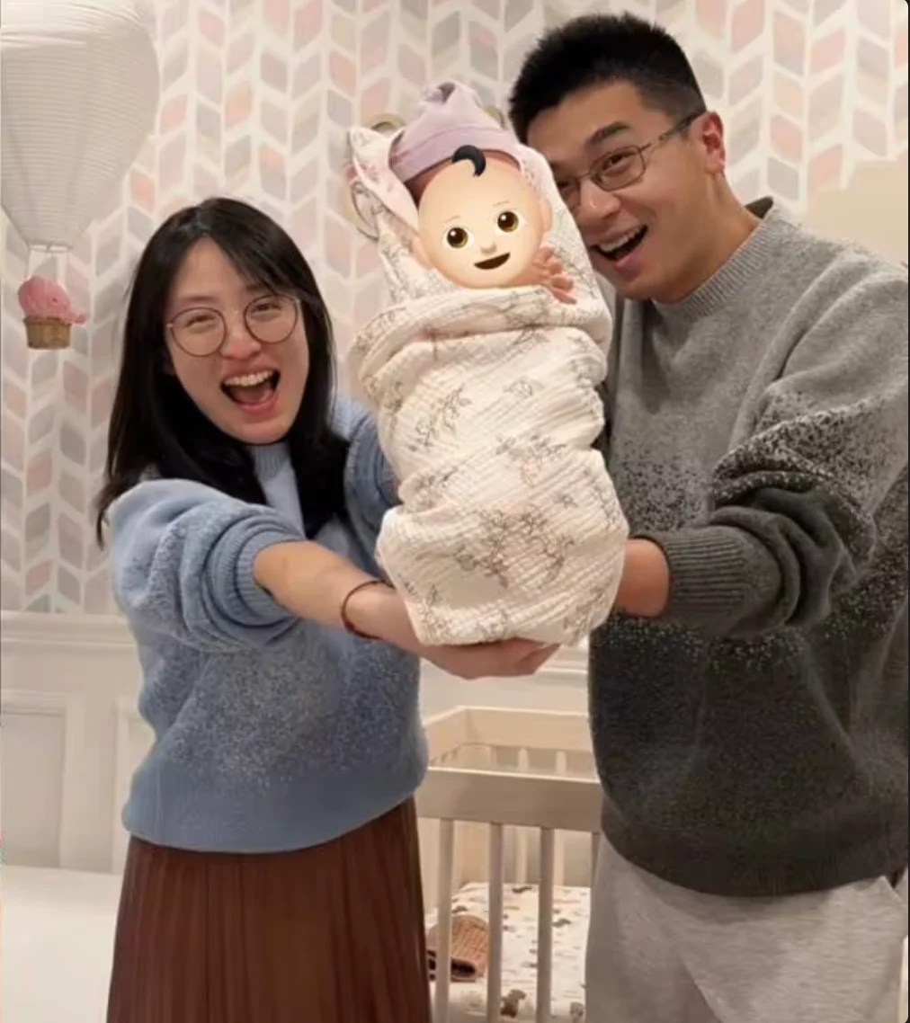 Paul with his wife and child