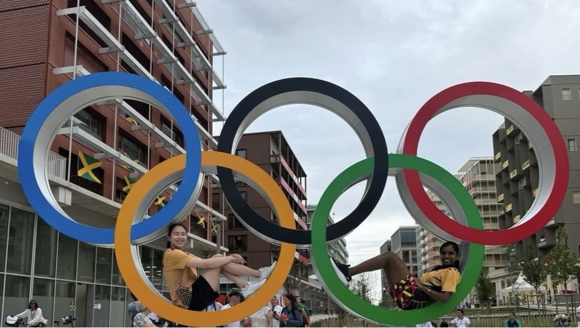 Pearly-Thinaah posing with Olympic rings