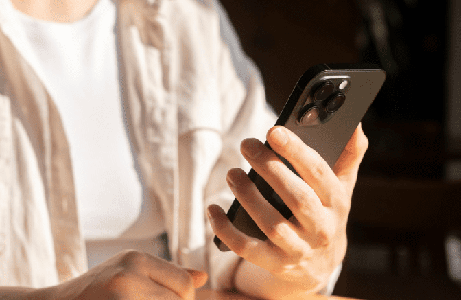 Person holding an iPhone
