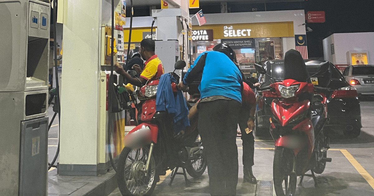 Petrol Station motorcycle pumping petrol (1)