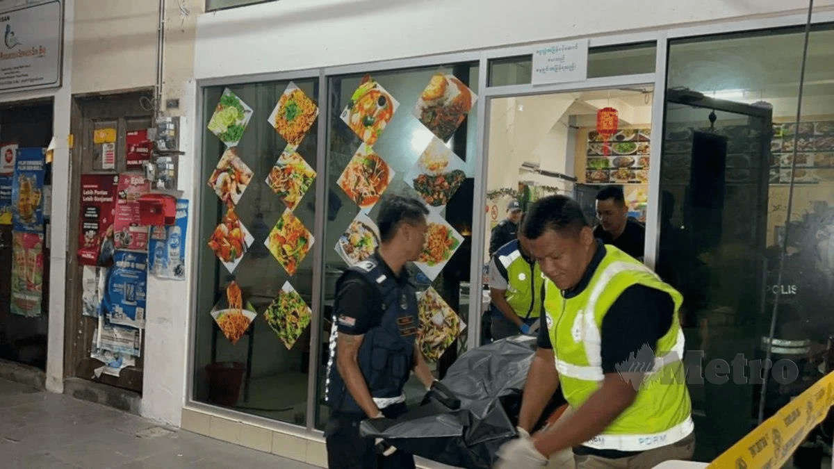 Police carrying body of Myanmar cook who got stabbed