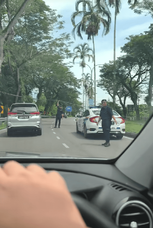 police helping to clear the traffic