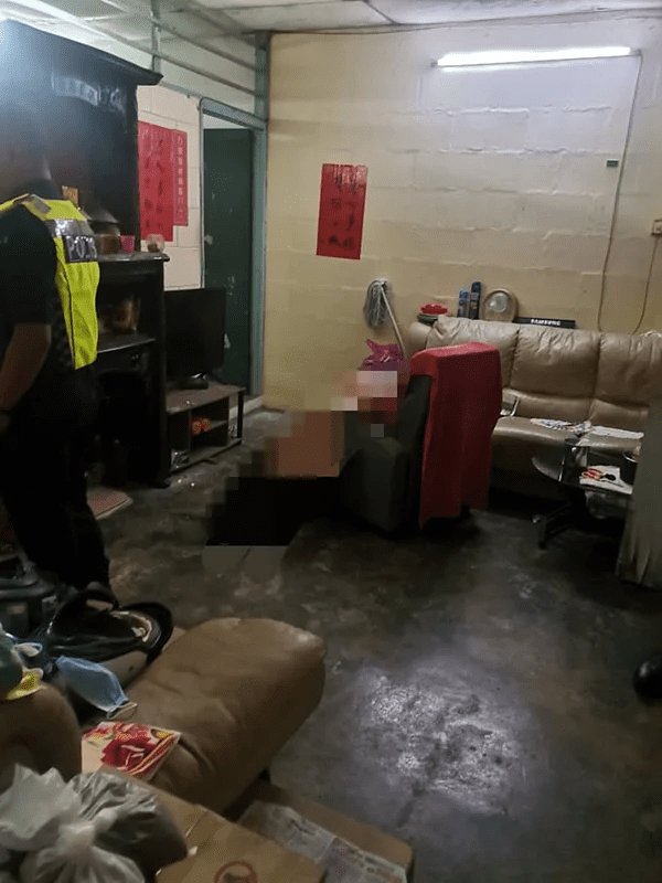 Police inside living room where old man was found dead in Penang