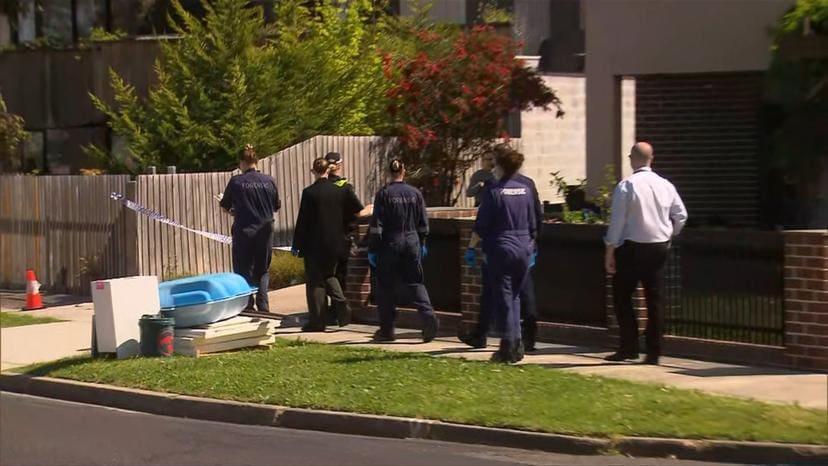 Police officers at KC Leong's house