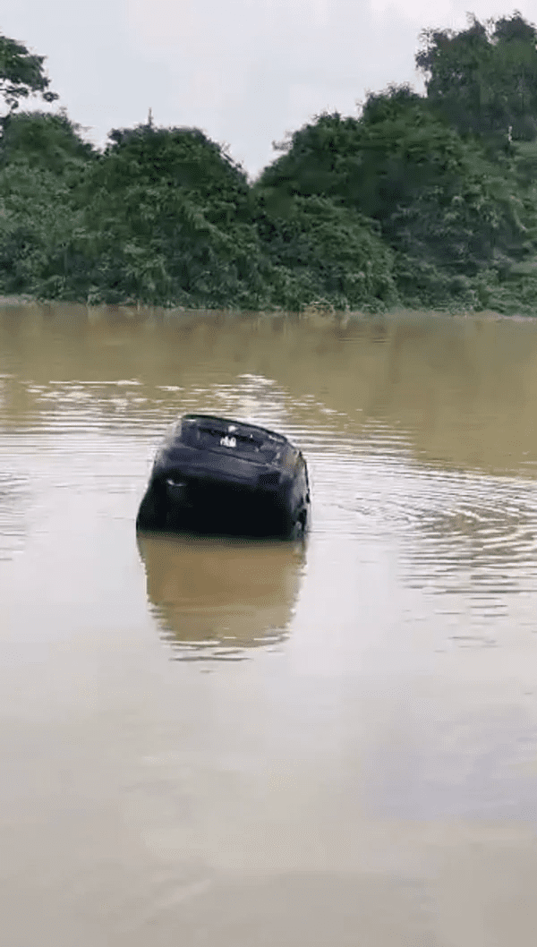 Proton Saga sinking into river in Johor