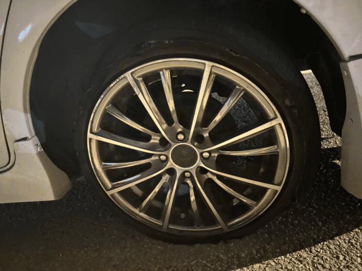 Punctured tyre on China woman's car