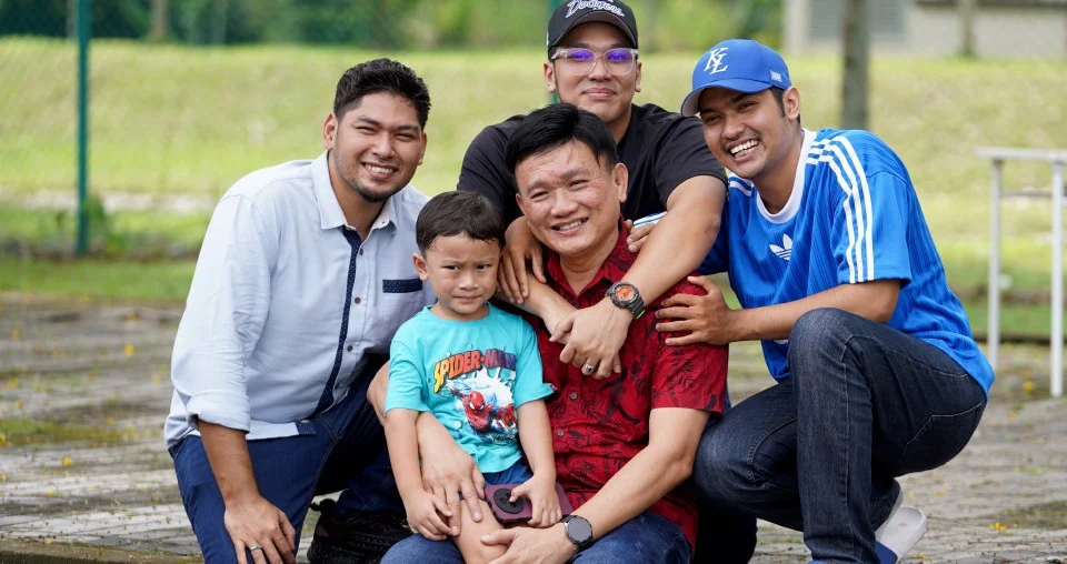 Michael Tong Wai Siong and his 3 Malay boys with grandchild