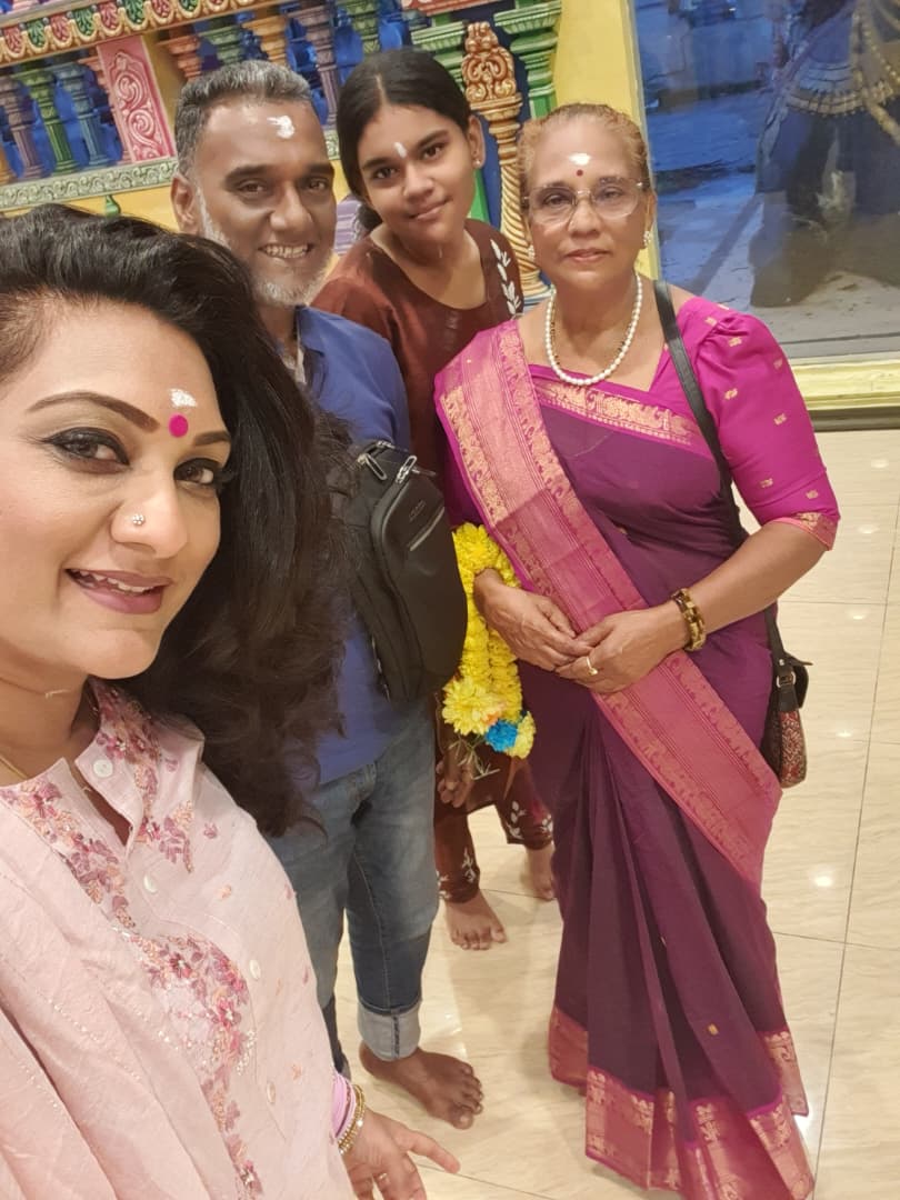 Rekha with her family