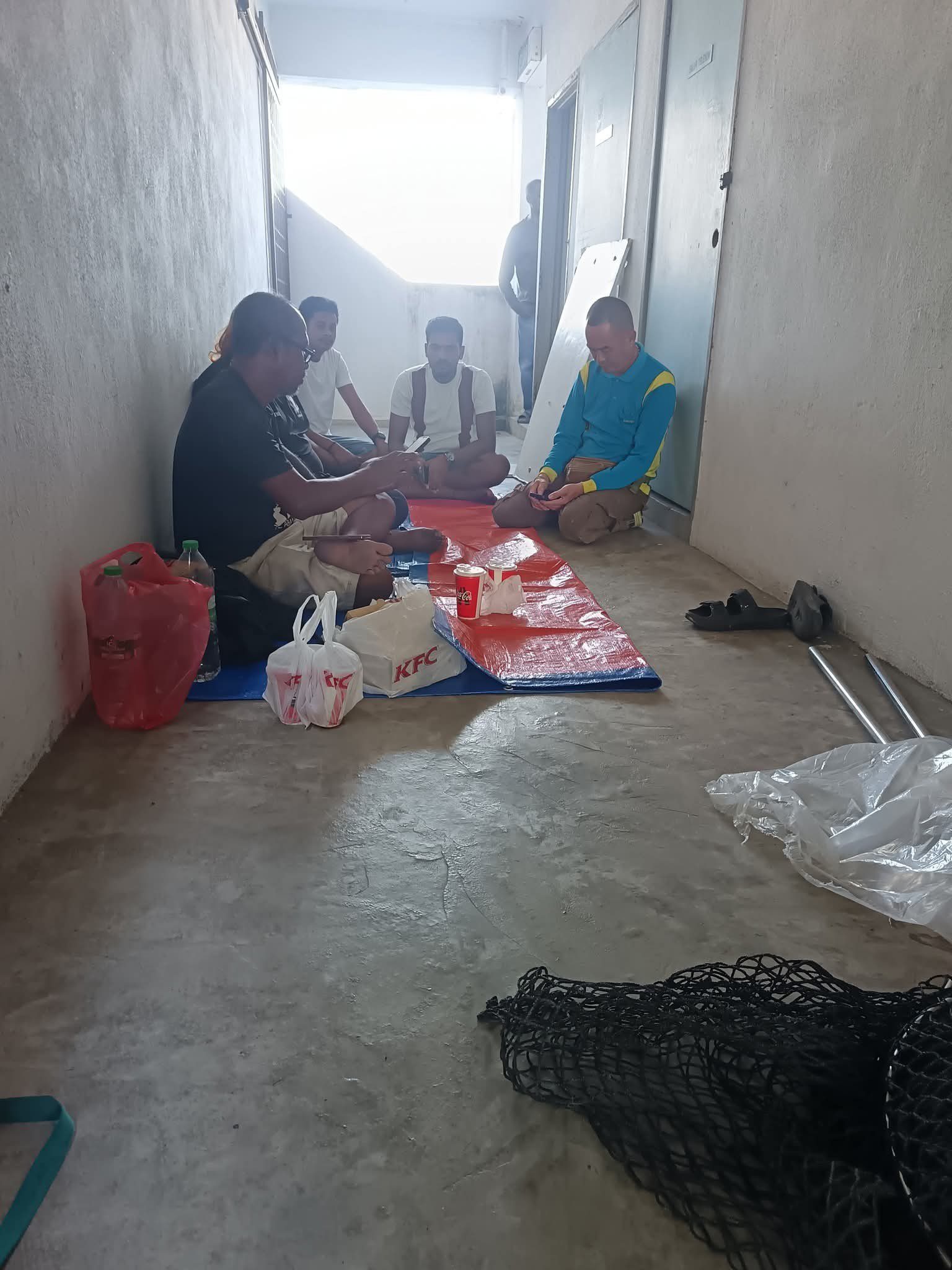 Rescuers preparing fried chicken for trapped dog