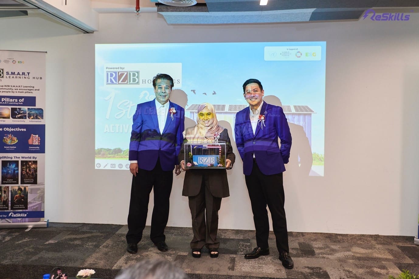 Reskills S.M.A.R.T Learning Hub token of appreciation passing