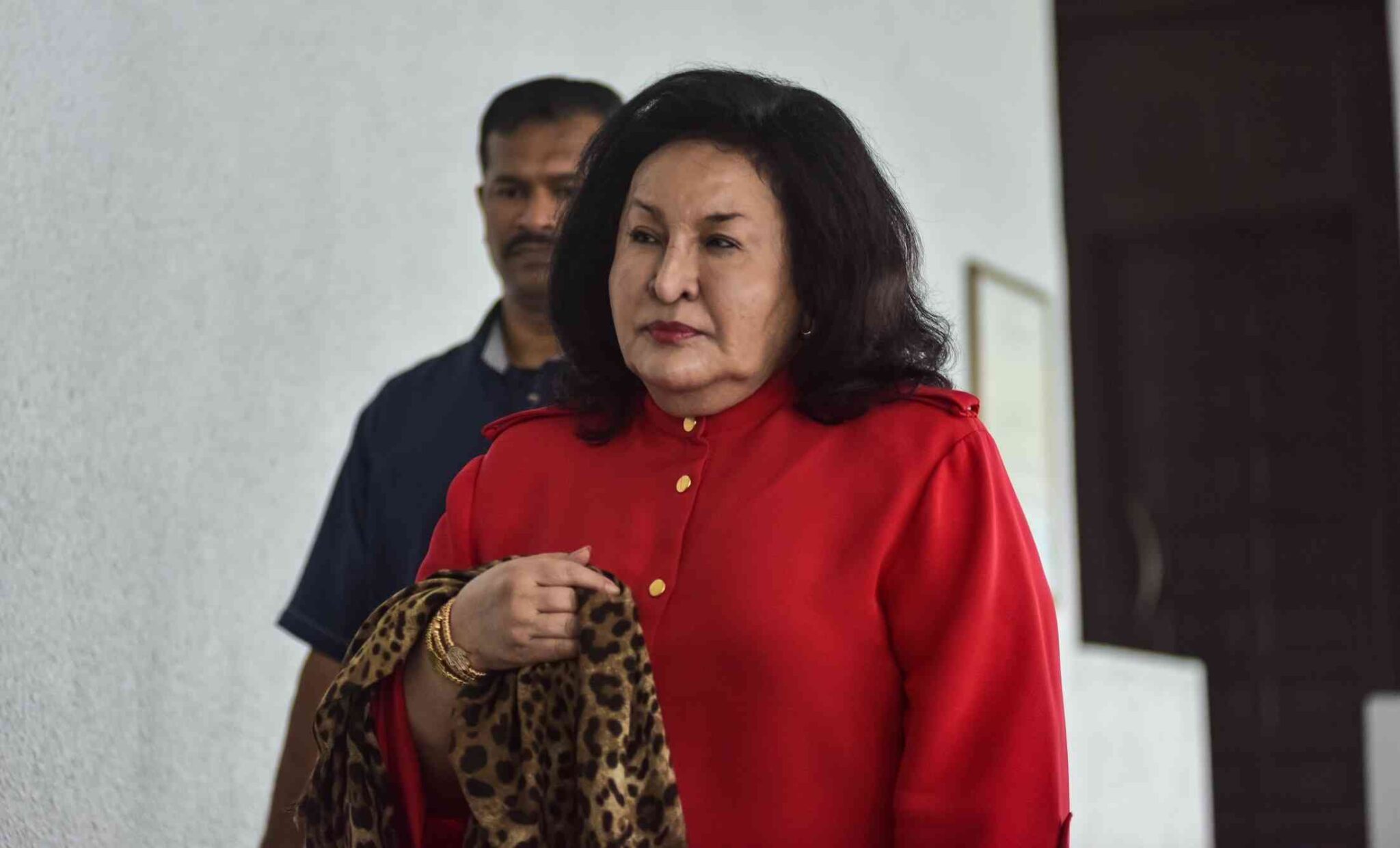ROSMAH-MANSOR walking out of the court