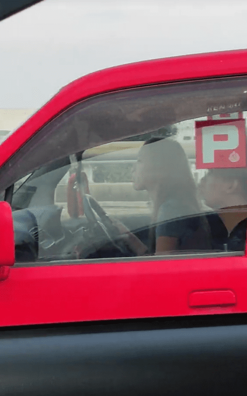 A female driver was seen driving car full of P stickers