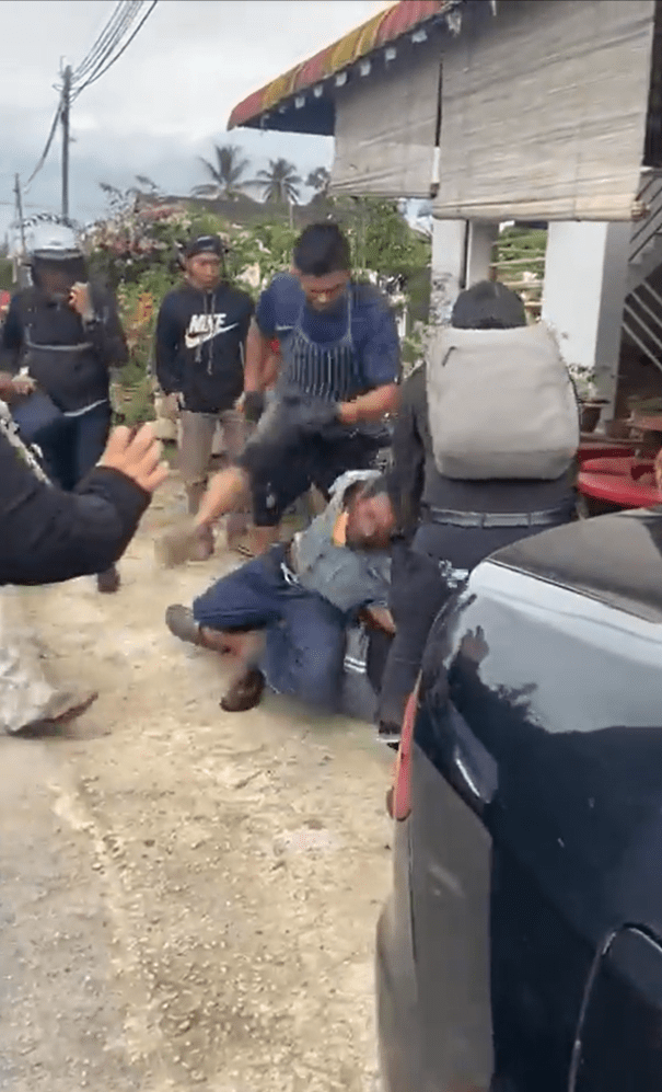 Man kicks Nepali man in the face