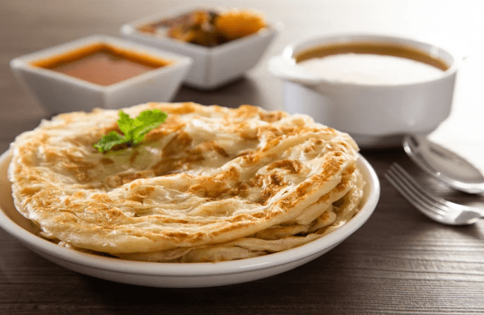Roti canai with curry