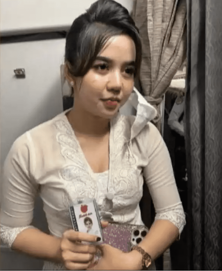 khairun nisa - flight attendant impersonator