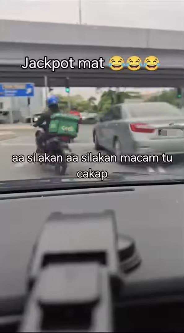 Sedan cutting queue in Johor