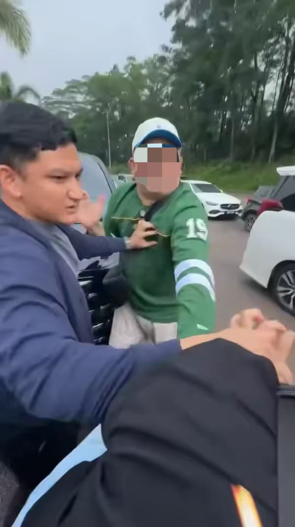 SG man beats M'sian man