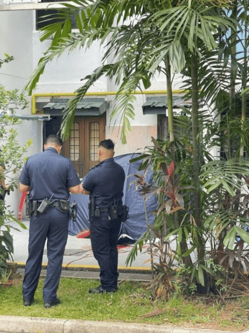 SG police at block where maid fell while cleaning windows