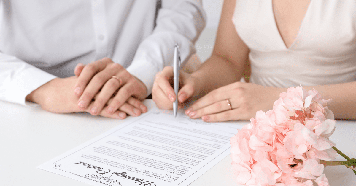 signing marriage certificate