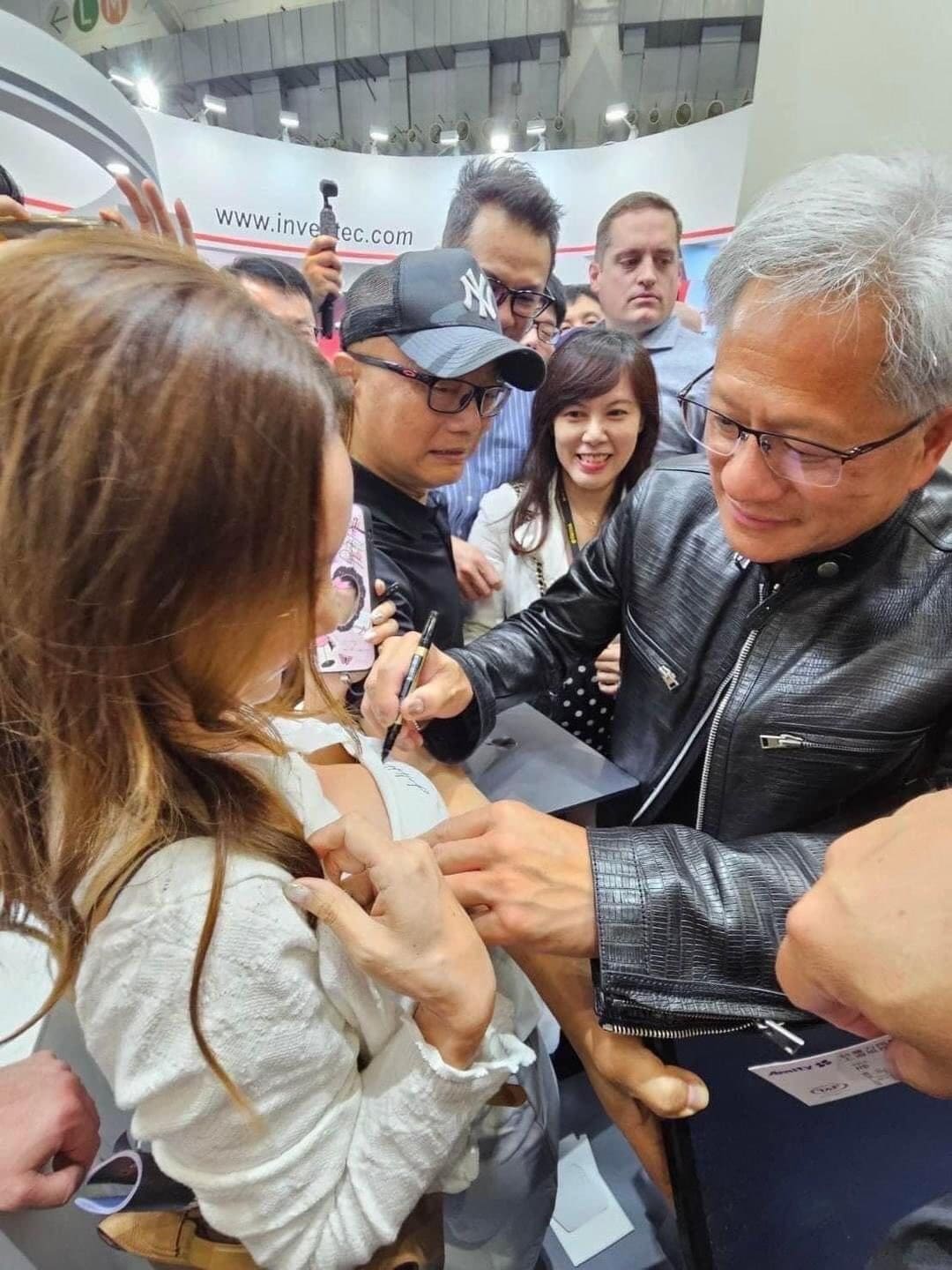 Signing on woman shirt