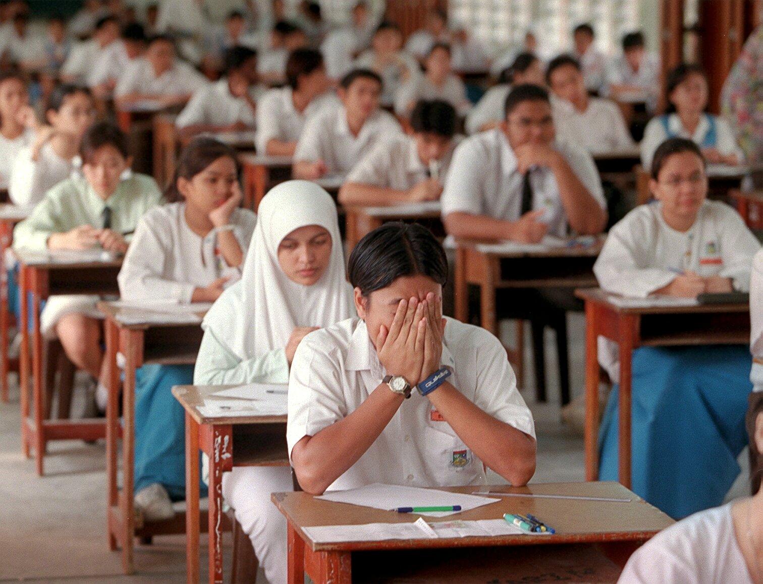SPM student stressing out in exam hall