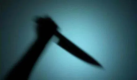 Knife in stabbing action