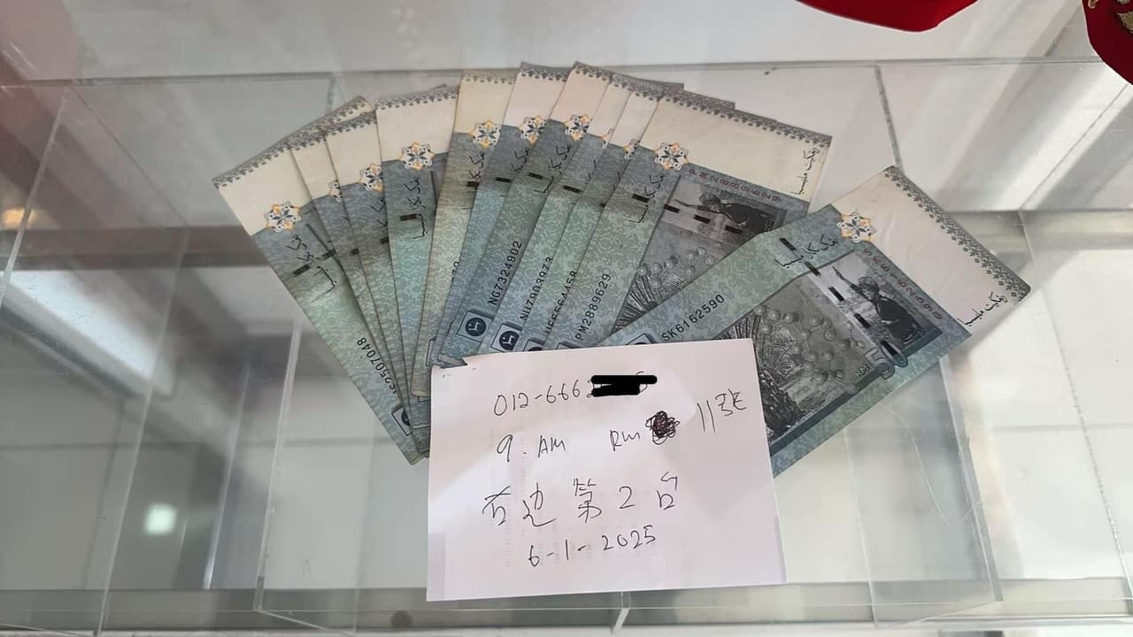 Stack of RM50 notes found at cash deposit machine