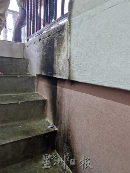 Stairs blackened by petrol bomb
