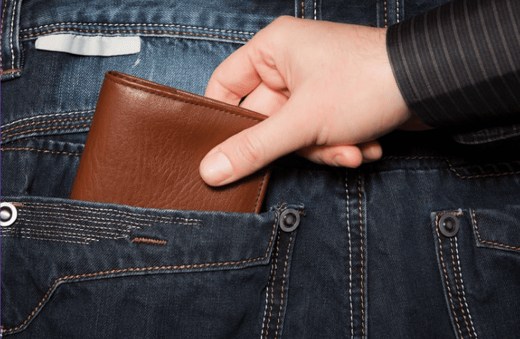 Stealing wallet from person's pocket