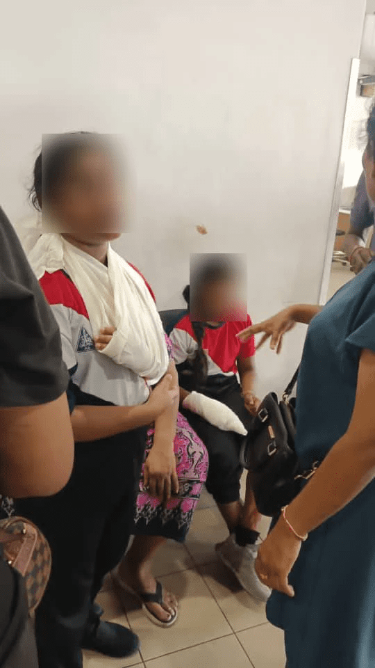 Students injured by overturned bus