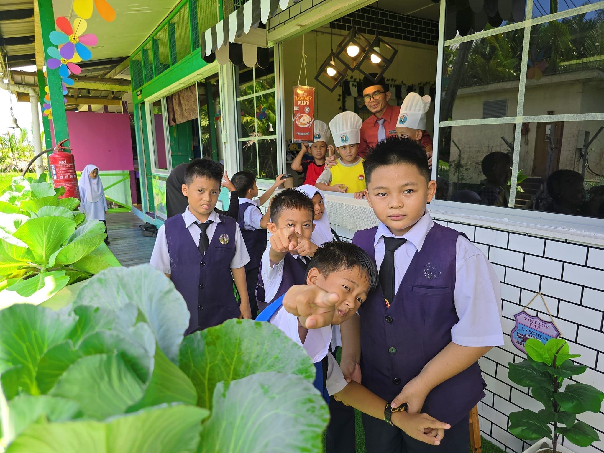students standing outside tehir cafe class