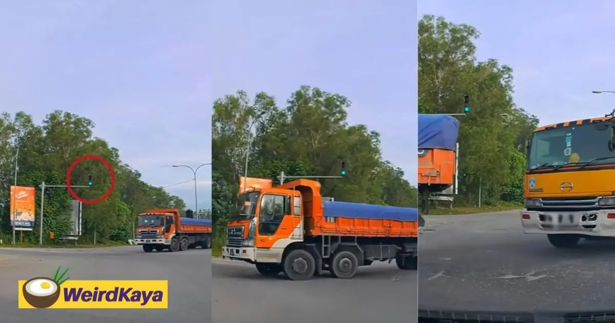 Two Lorries Seen Running Red Light At Intersection, M'sian Forced To Stop In The Middle Of The Road