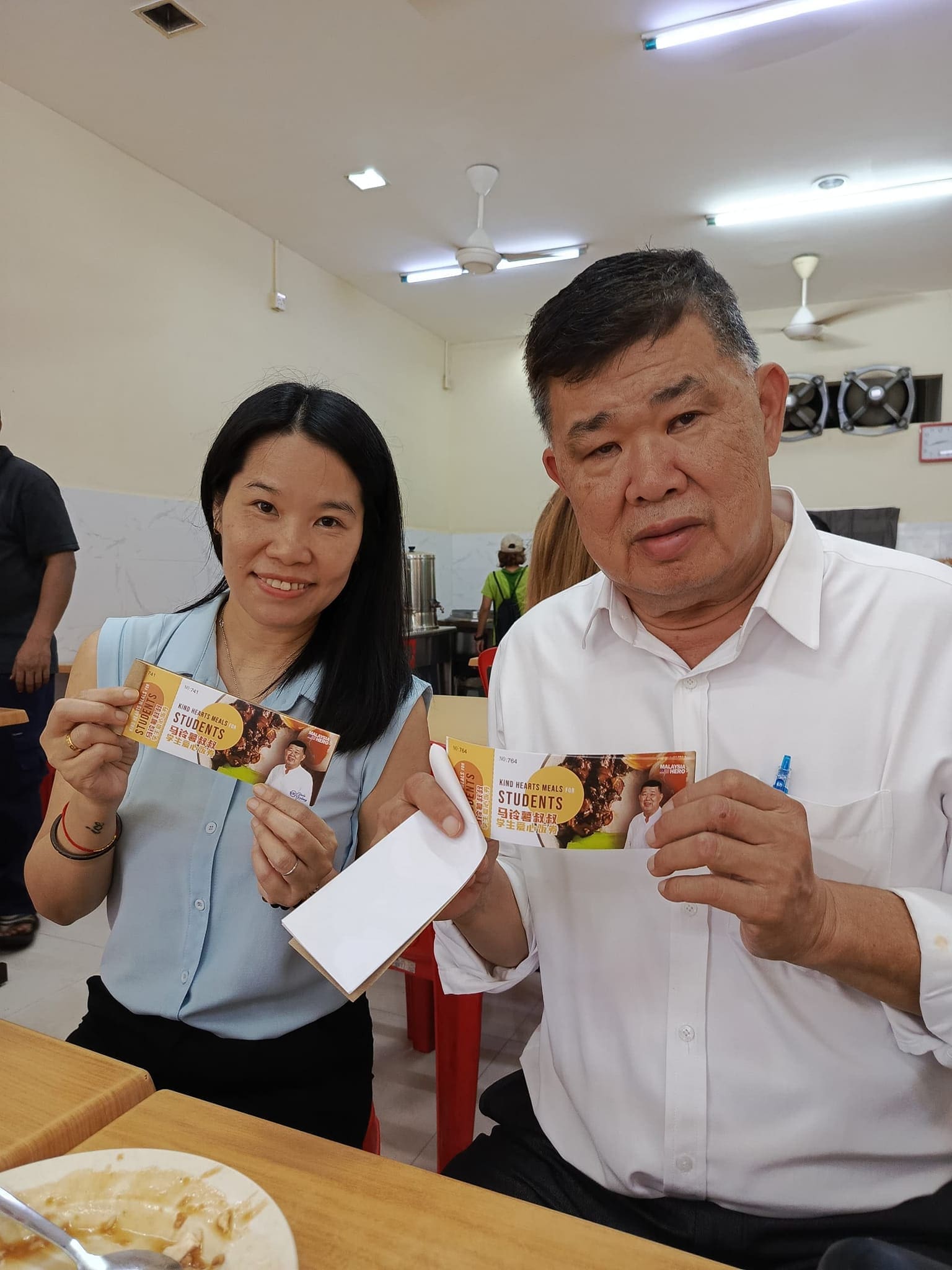 Uncle Kentang with food coupons