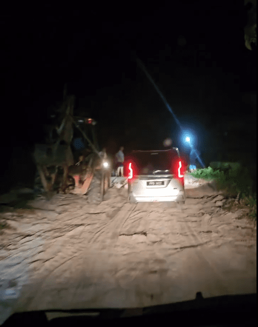 Villager pave the road with Backhoe