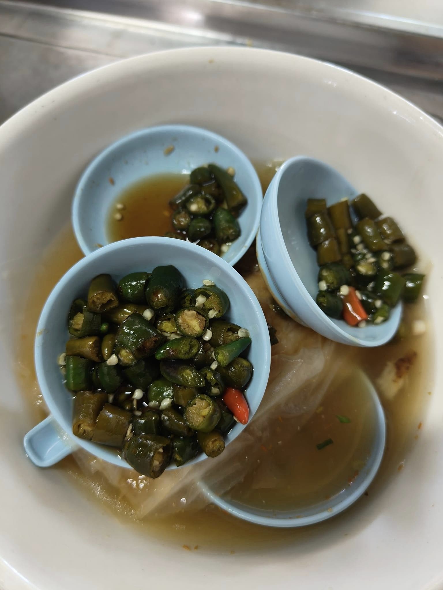 Customer wastes 3 servings of green chili