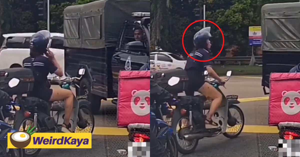 [video] m'sian biker sheepishly puts helmet back on after getting busted by police | weirdkaya