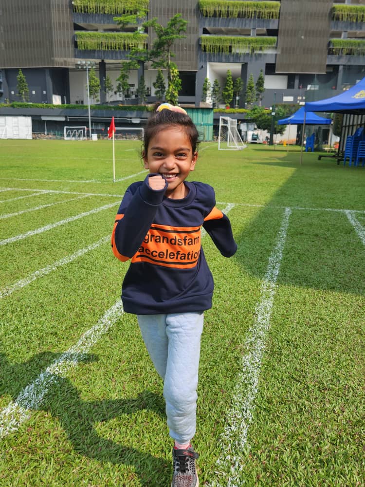 6yo Jacquelin Kaur training at a field