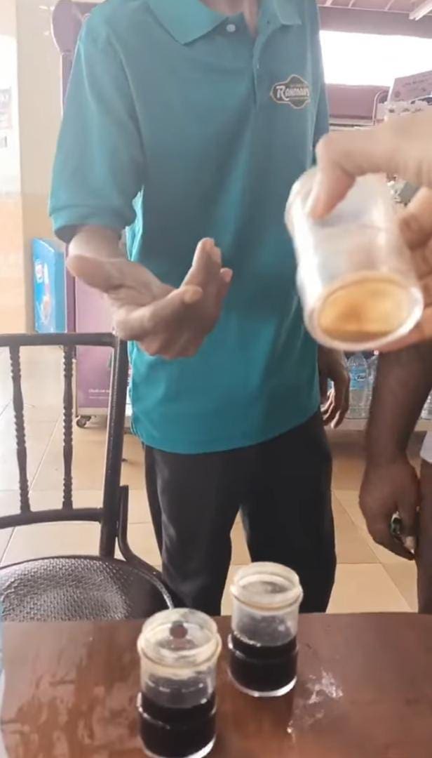 woman confronting restaurant worker about the soy sauce container