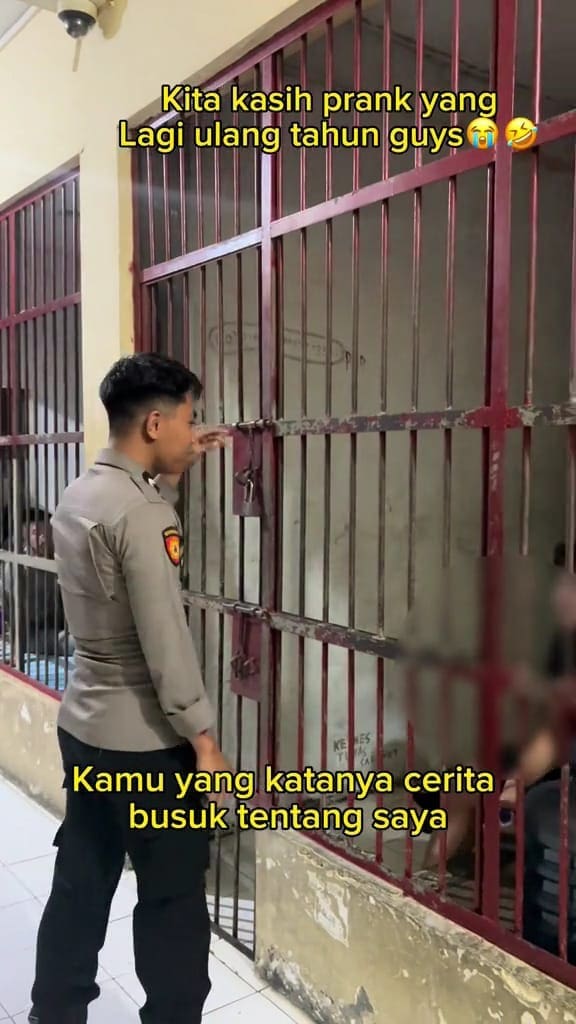 prison guard talking to an inmate