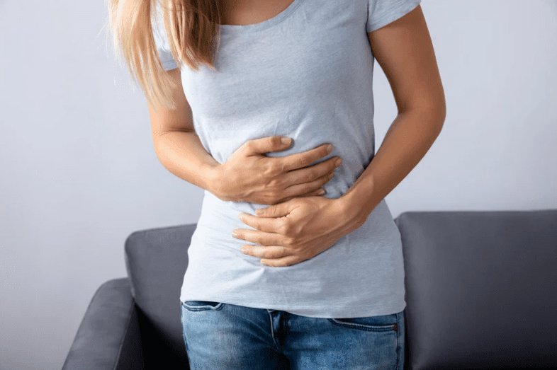 Woman having stomach pains