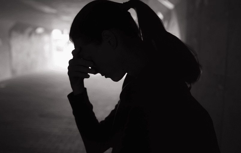 woman looking sad