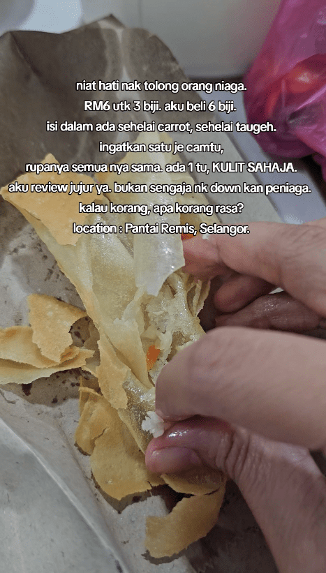 woman showing popiah with no fillings