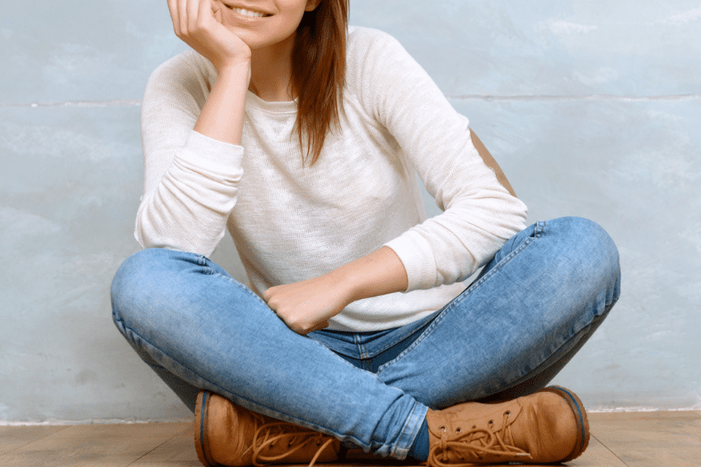 Woman sitting cross-legged