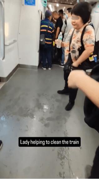 Woman spits water on S'pore MRT train (3)