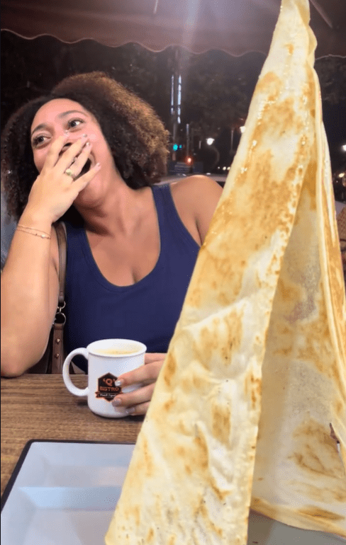 Zahra laughing at roti tisu 1