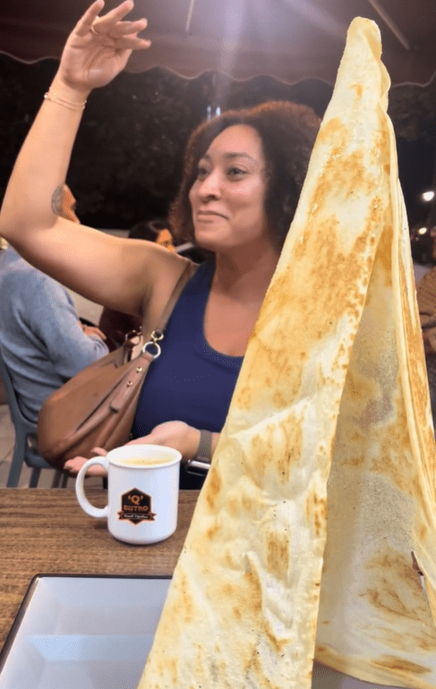 Zahra laughing at roti tisu 2